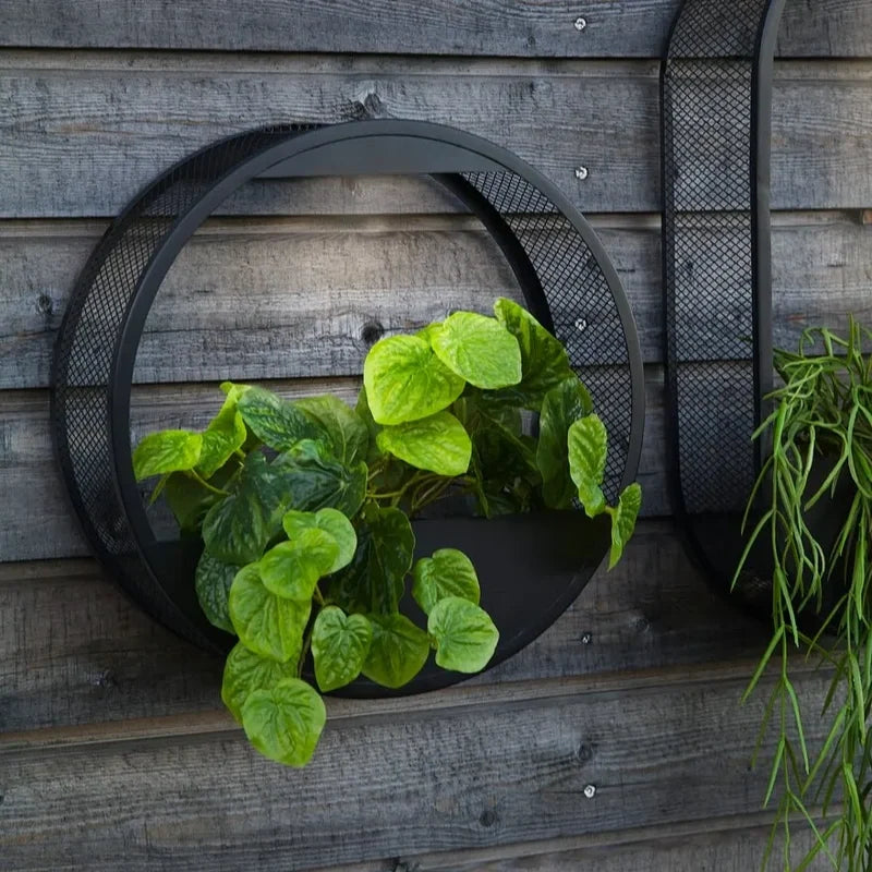 Zonne-energie wandlamp met bloempot